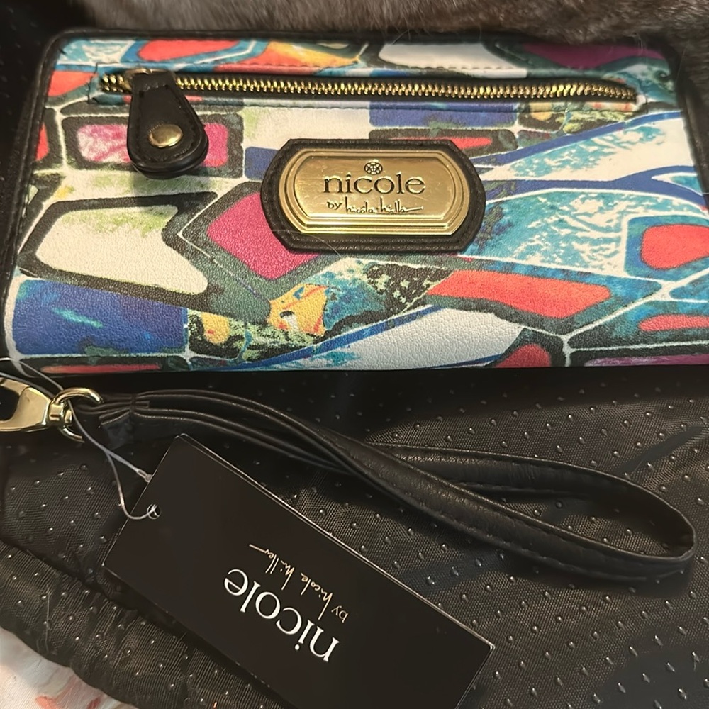Ladies wallet. Multi color Nicole by Nicole Miller Never used! Still has tags